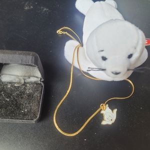 Preowned Seamore the Seal Beanie Baby with a pretty seal necklace.